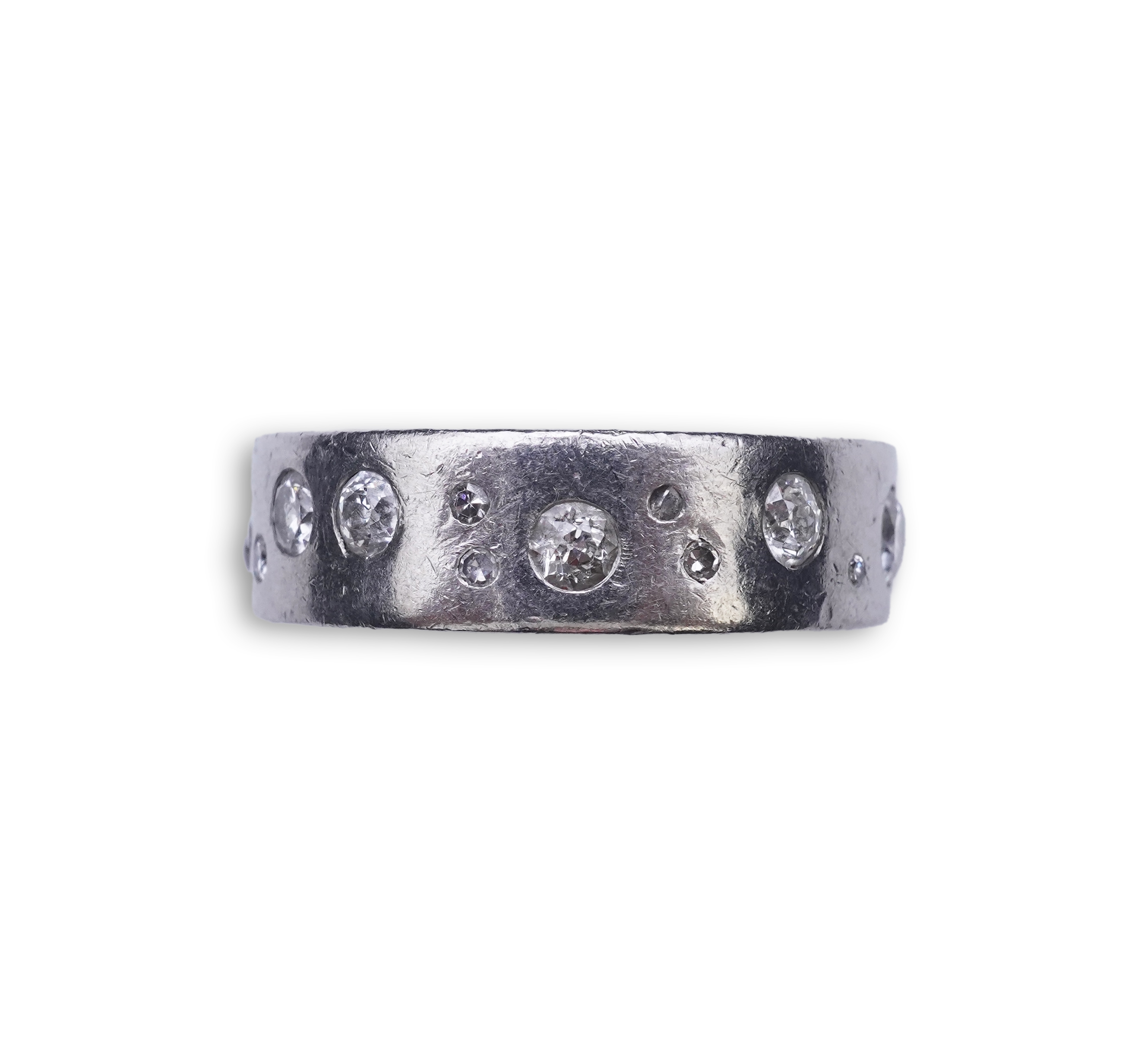 A platinum and diamond eternity ring